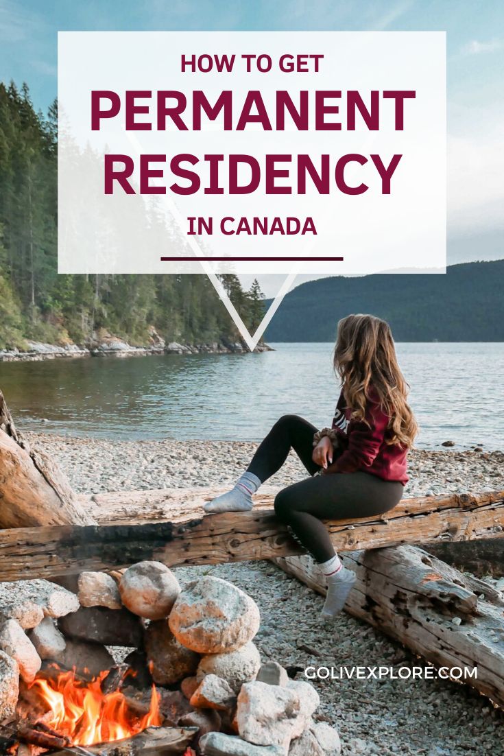 a woman sitting by a campfire with the text how to get permanent residence in canada