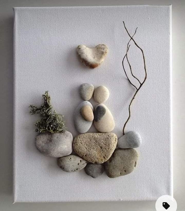 some rocks and plants on a white canvas