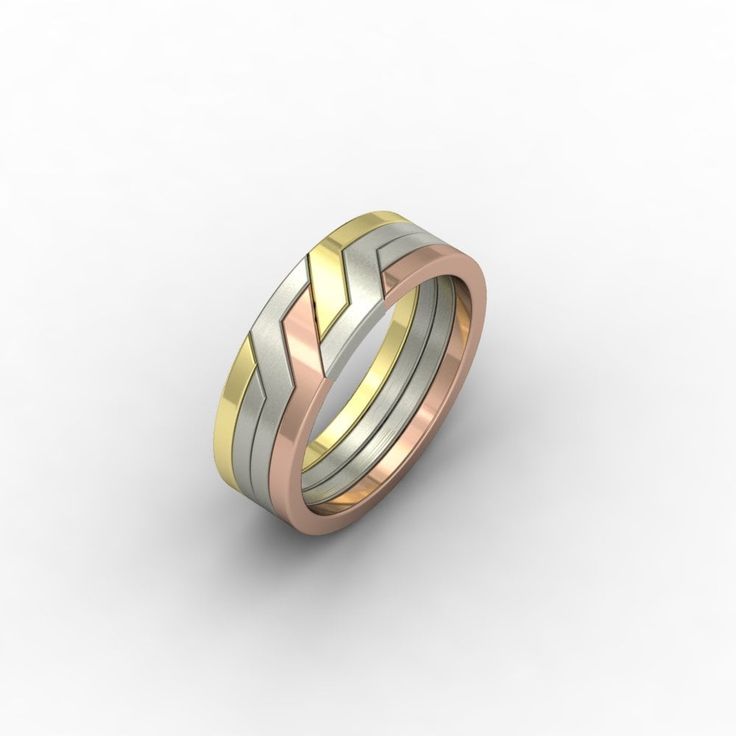 two tone gold and silver wedding bands with diagonal stripes on each side, set in 18k yellow gold