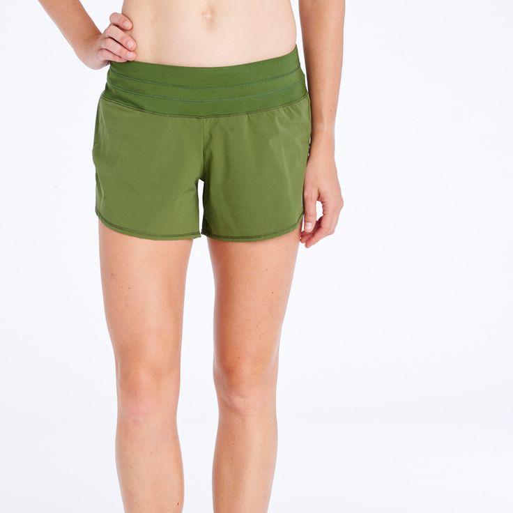 The Roga short is a super flattering yoga style waistband running short with pockets. The Roga Revolution started here. Green Athletic Shorts With Built-in Shorts, Relaxed Fit Go-dry Athletic Shorts For Yoga, Green Athletic Shorts With Elastic Waistband For Training, Sporty Yoga Shorts With Waistband, Casual Running Shorts With Contoured Waistband, Casual Athletic Shorts With Comfort Waistband For Yoga, Casual Yoga Athletic Shorts With Comfort Waistband, Green Athletic Shorts With Built-in Liner For Running, Green Activewear With Elastic Waistband For Training