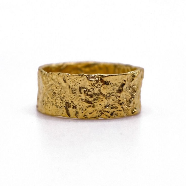 Hammered, molten and beautifully imperfect, this solid gold wide band ring is designed to encapsulate the powers of Goddess Athena - wisdom, courage and strength. This ring is one of our best sellers and is perfect for stacking, wearing as a thumb ring or alone.Our solid gold rings are made to order just for you, so please allow 2-3 weeks for dispatch. Solid Gold ring orders are final sale and cannot be exchanged or returned. We recommend placing an order for silver or gold plated first to ensure the size and design are perfect for you. Then, those pieces can be exchanged & applied to your solid gold version. Gold Thumb Ring, Gold Thumb Rings, Goddess Athena, Hammered Gold Ring, Athena Goddess, Wide Band Ring, Hammered Band, Spike Earrings, Hammered Rings