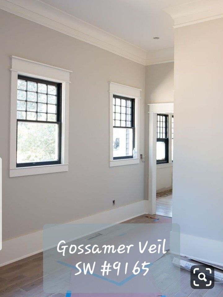 an empty room with three windows and the words gossamer weil swi 917