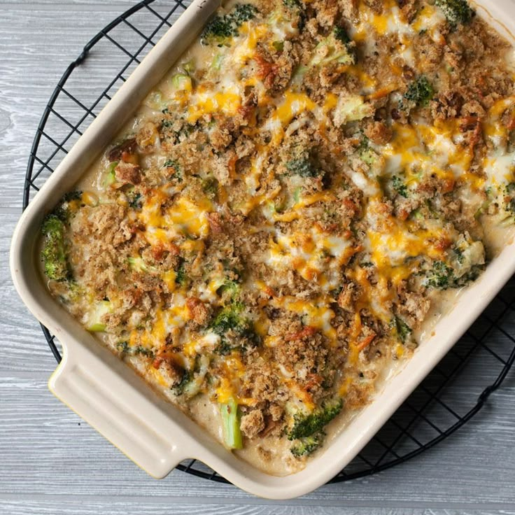 a casserole dish with broccoli and cheese