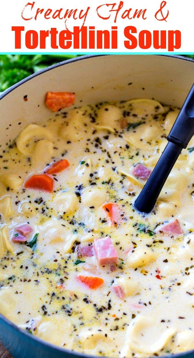 creamy ham and tortellini soup in a blue pot