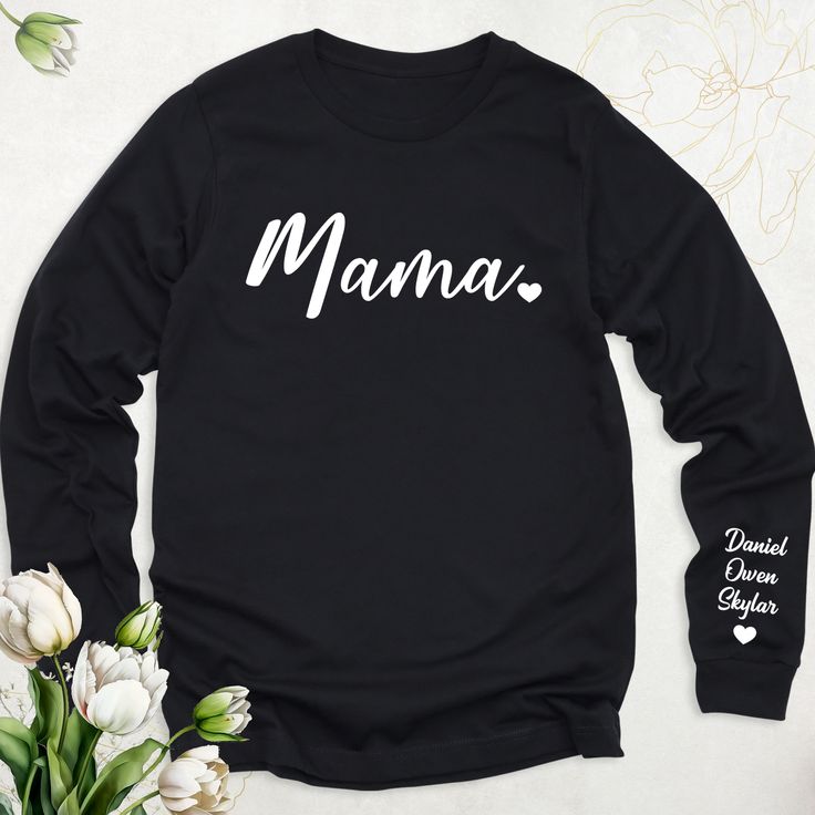 Our "Cool Mom" Shirt is the perfect blend of comfort and style, allowing you to embrace motherhood with confidence. With its trendy design and chic statement, this shirt lets you showcase your cool and fashionable side while tackling the demands of parenting. Whether you're running errands, attending school events, or simply lounging at home, do it all in style with our "Cool Mom" Shirt. PLEASE SPECIFY TEXT UP IN THE BOX! Soft style Solid color: 100% Airlume combed and ring-spun cotton Heather Colors: 52% Airlume Combed and ring-spun cotton, 48% polyester Heather Sport colors: 60/40 polyester/cotton 100% No Sweatshops & Eco-Friendly Production *Product contents vary according to brands, this information shows average values.*Please check the size guide and color chart before purchasing a p Black Long Sleeve T-shirt For Family Matching, Family Matching Long Sleeve Tops With Custom Print, Black Relaxed Fit Top With Name Print, Family Matching Long Sleeve T-shirt, Black Family Matching Shirt For Mother's Day, Long Sleeve Tops With Name Print For Family, Trendy Long Sleeve T-shirt For Mother's Day, Long Sleeve Tops With Letter Print For Mother's Day, Comfortable Long Sleeve T-shirt With Text Print