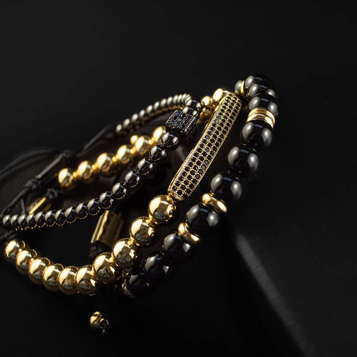 Chase your luck with the Vegas bracelet stack! The Vegas stack features trifecta of beaded beauties - black onyx, golden glitz, and rhodium PVD for a triple threat of style. Plus, a lucky dice and CZ bar for a dash of extra luck. Indulging the adventurous spirit and wandering heart that lives within all of us, our men's bracelet stacks have been crafted to provide a touch of class to your wardrobe throughout the year. Each exquistely curated stack includes a mix of spiritually healing gemstones Classic Black Stackable Jewelry, Elegant Black Stackable Bracelets, Black And Gold Bracelet Stack, Black Stackable Bracelet, Black Bohemian Stretch Bracelet Stackable, Triple Threat, Meaningful Jewelry, Gemstone Beaded Bracelets, Premium Gift