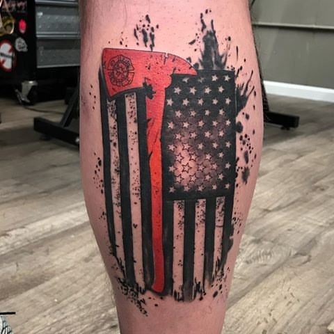 an american flag tattoo on the leg