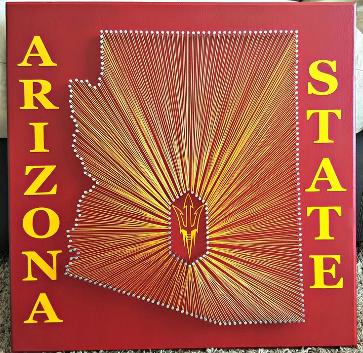 a red arizona state sign with the word arizona on it