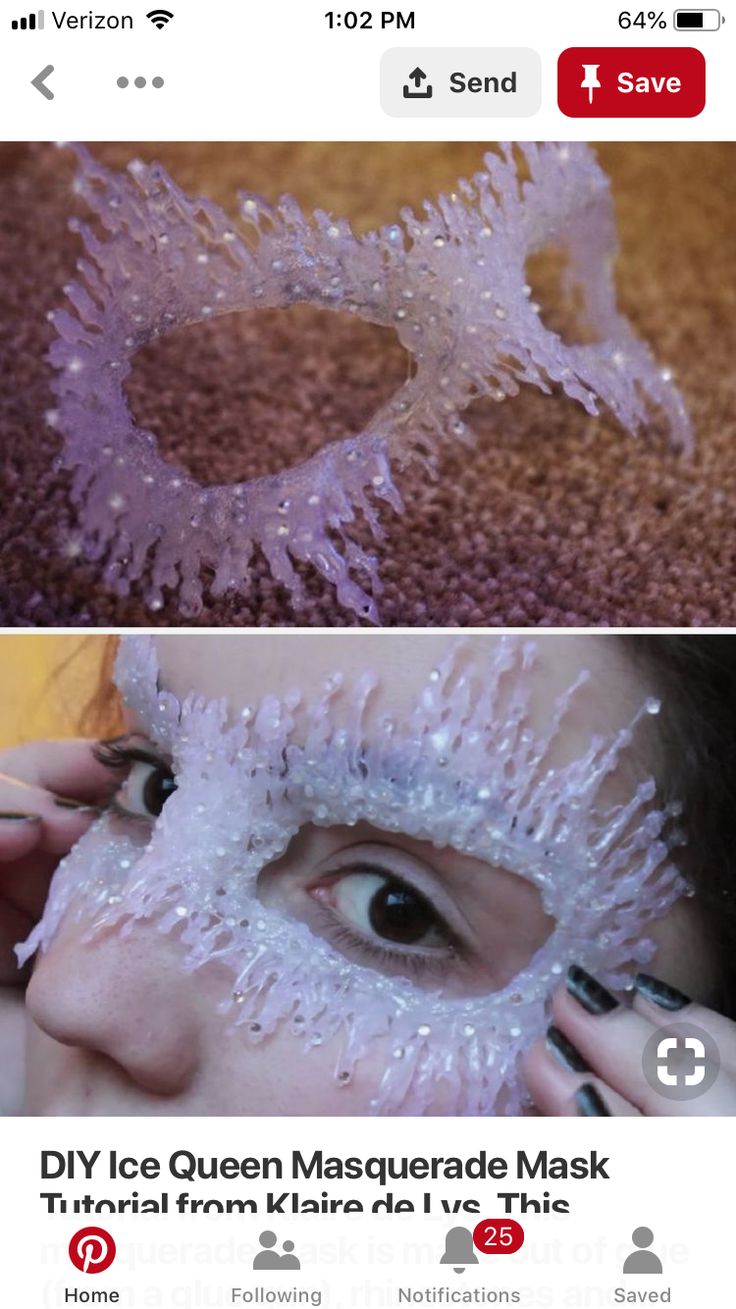 a woman with her face covered in ice and wearing a mask that looks like a snowflake