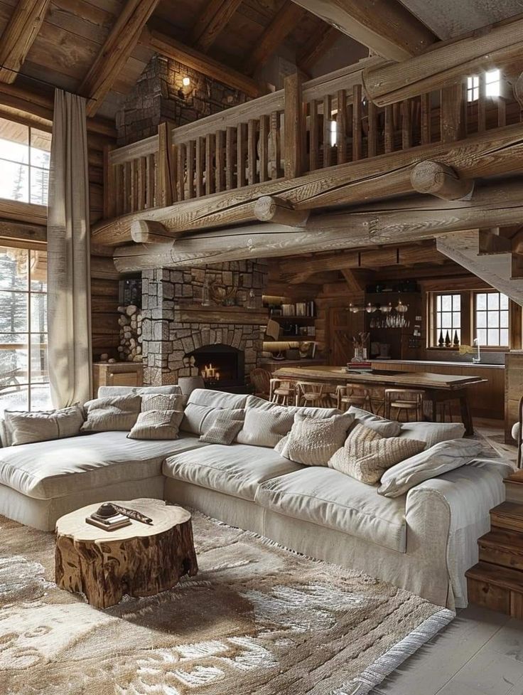 a living room filled with furniture and a fire place in the middle of a room