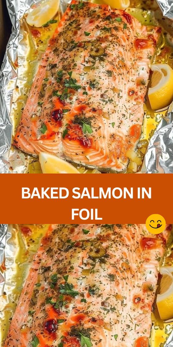 baked salmon in foil with lemons and parsley on the side to show how well it is cooked