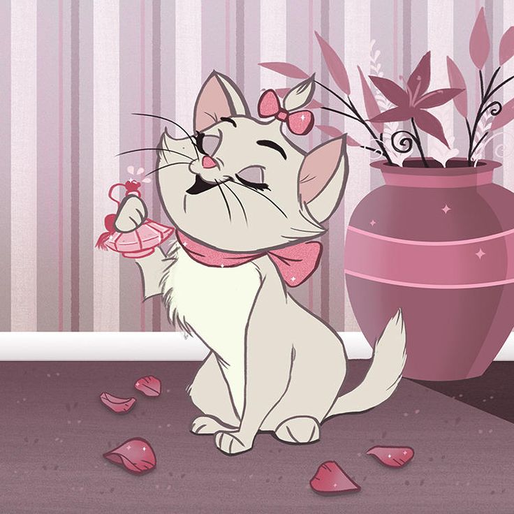 a white cat sitting on the ground next to a pink vase with flowers in it