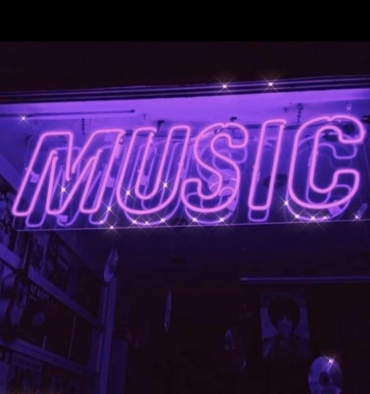 the word music is lit up in purple