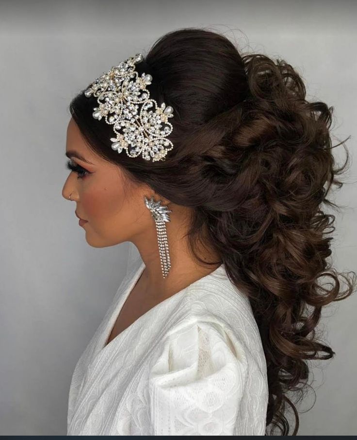 a woman wearing a bridal hair comb