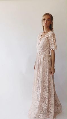 Blush wrap lace bohemian wedding dress, butterfly sleeves $355.00 Summer V-neck Lace Bridesmaid Dress, Summer V-neck Bridesmaid Lace Dress, Elegant Flowy V-neck Lace Dress, Feminine V-neck Delicate Lace Dress, Beige Lace Dress With V-neck, Feminine V-neck Lace Back Dress, V-neck Lace Dress For Wedding Guest, Flowy Feminine Lace Dress, Delicate Lace V-neck Dress