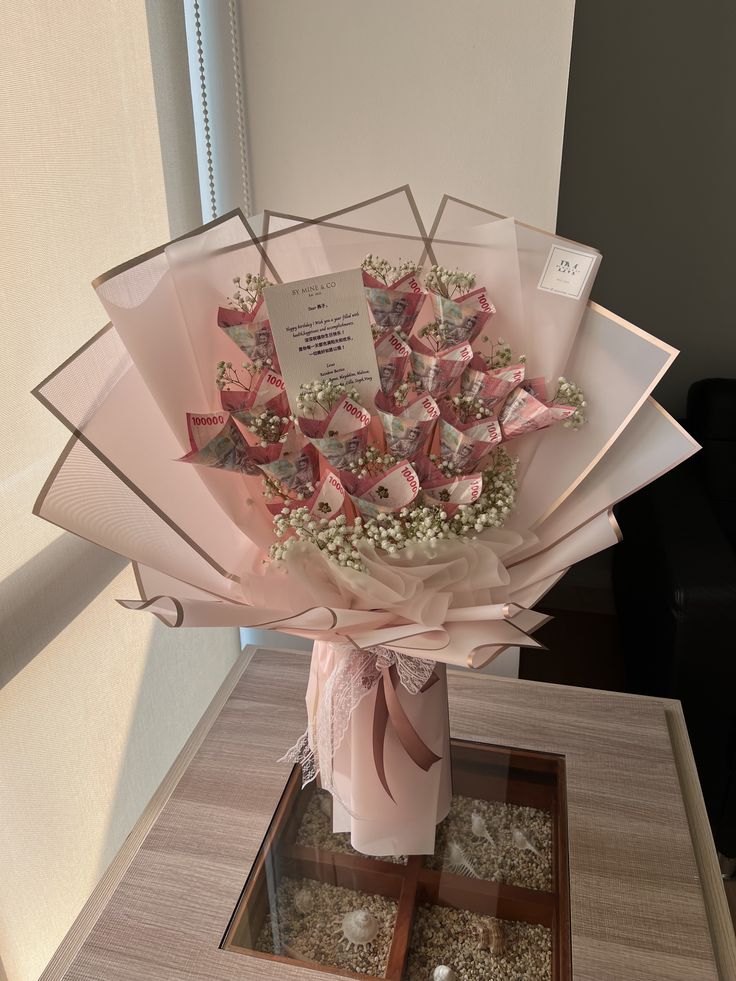 a bouquet of flowers sitting on top of a table