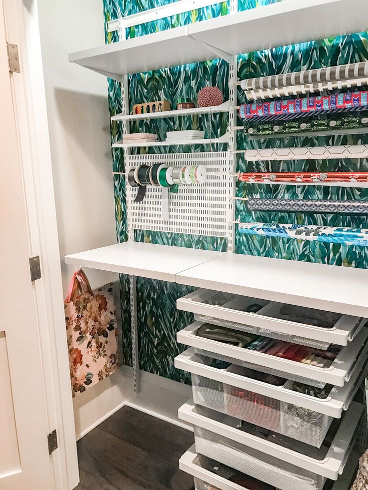 an organized sewing closet with lots of crafting supplies