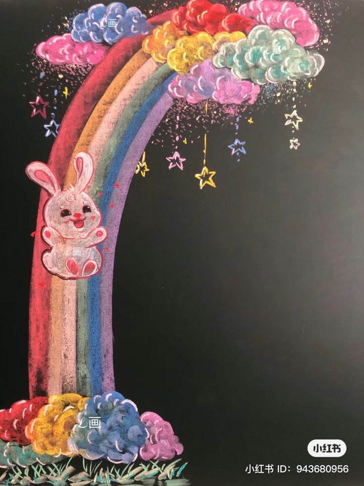 a drawing of a rainbow with a bunny on it