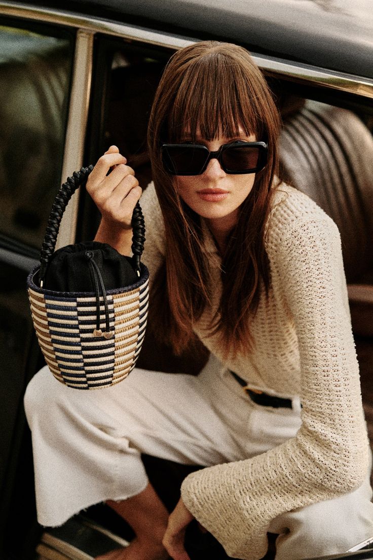 A luxe, new take on the bag that started it all - our signature Lunchpail, now finished with an intricately hand-braided Nappa Leather handle, from a centuries old Italian atelier heralded for it’s world class quality and attention to details. Cesta baskets are handwoven by female artisans in Rwanda, Africa, using locally sourced, renewable resources. Each piece is hand finished in Italy with carefully chosen, sustainable materials. Product Details: 6" W x 6.5" T x 6" D Leather: Vegetable Tanned Rwanda Africa, Behind Every Great Man, Lunch Pail, Black Basket, Jane Birkin, Great Women, Women Artisans, Knit Fashion, World Class