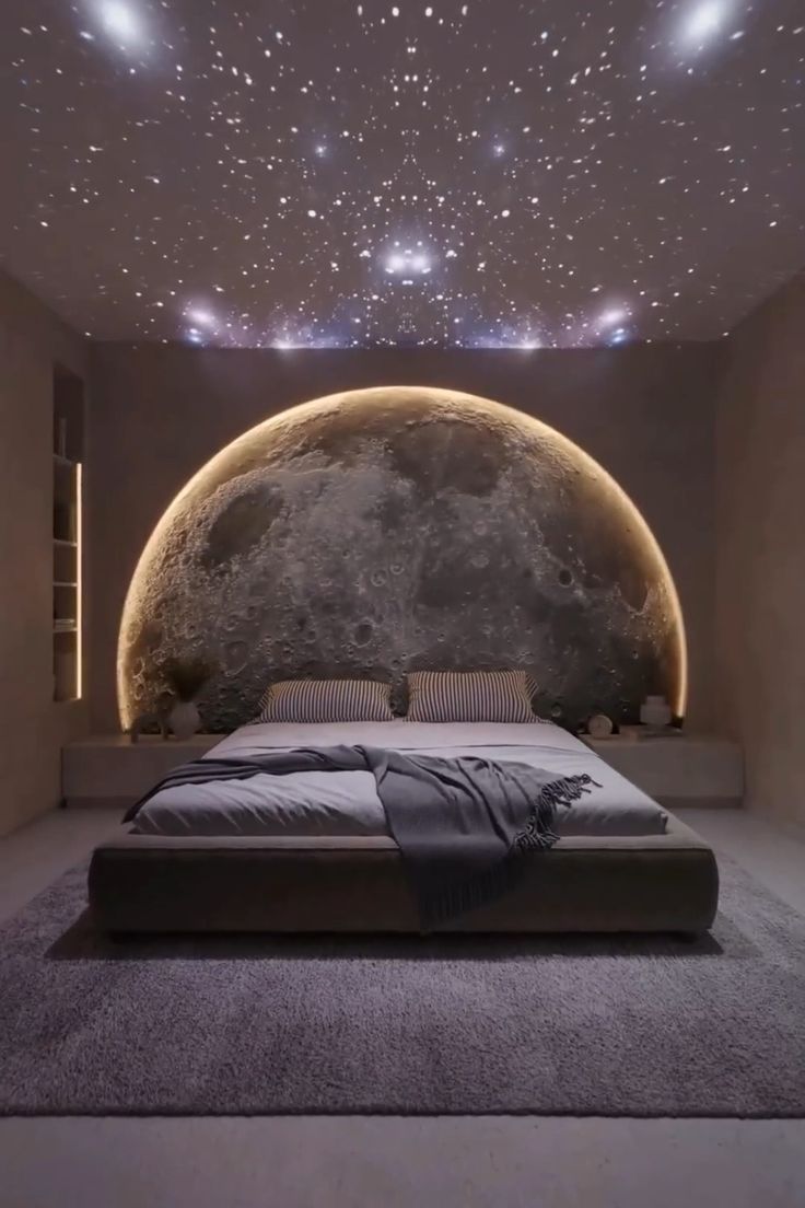 a large bed sitting in the middle of a bedroom under a sky filled with stars