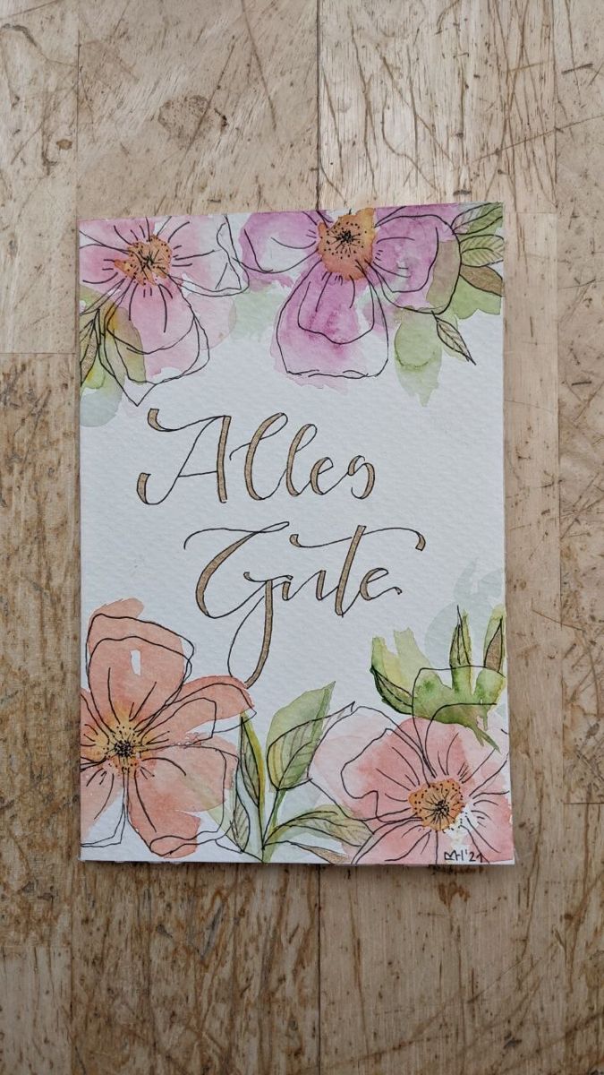 a greeting card with watercolor flowers and the words,'alco gate '