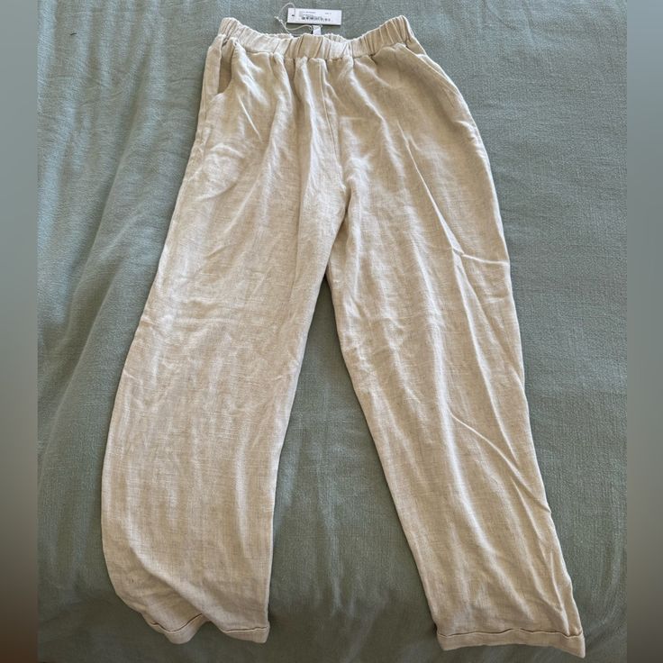 New With Tags Rachel Pally Linen Pants Size Small Natural Linen Mikko Pant Beige Relaxed Fit Bottoms For Lounging, Relaxed Fit Beige Bottoms For Lounging, Beige Sweatpants For Lounging, Beige Tapered Leg Lounge Pants, Beige Straight Leg Loungewear Bottoms, Beige Lounging Pants With Pockets, Beige Pants With Pockets For Lounging, Beige Straight Sweatpants For Loungewear, Relaxed Beige Bottoms For Lounging