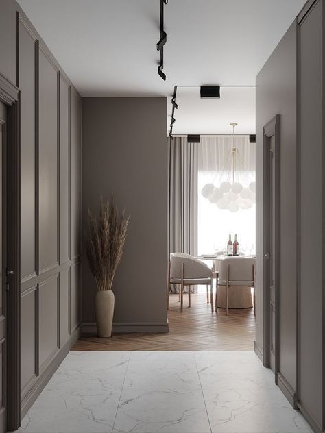 an empty hallway leading to a dining room