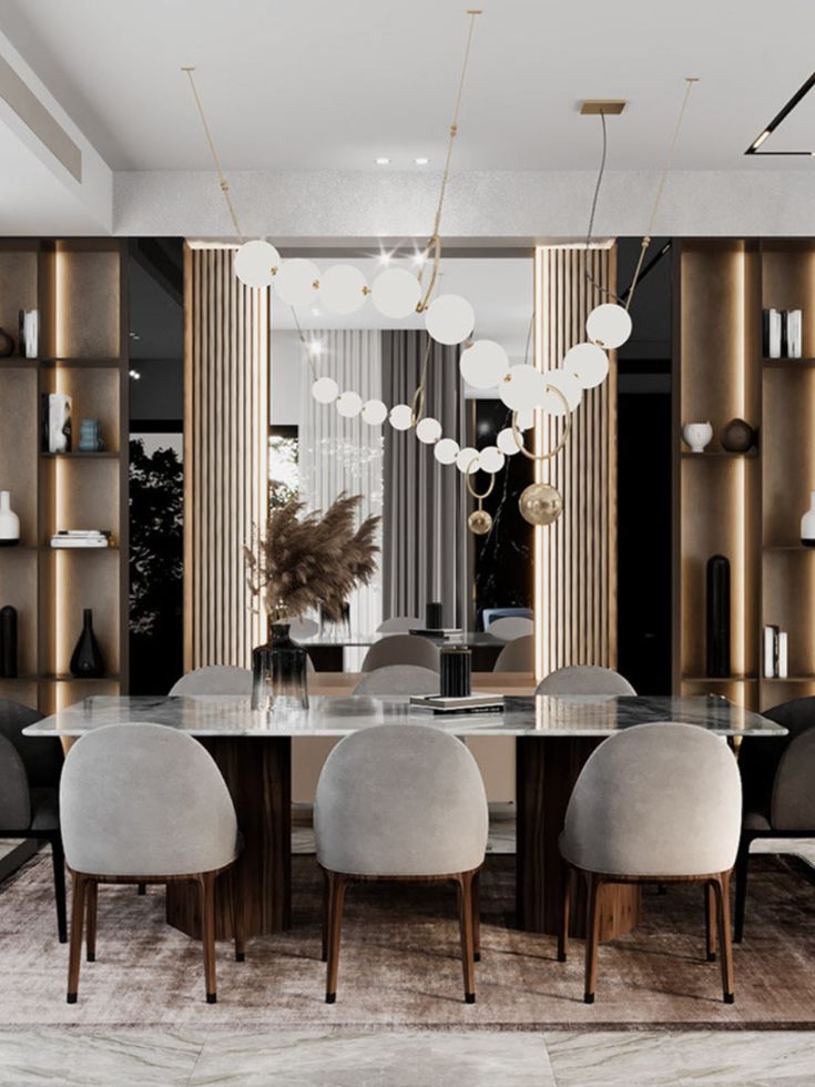 an elegant dining room with modern furniture and lighting