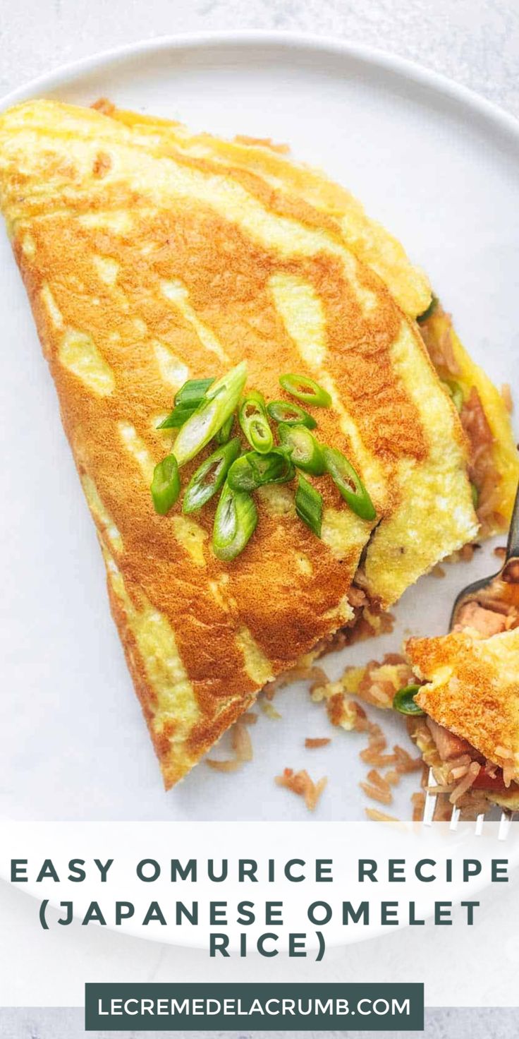 an omelet on a white plate with a fork