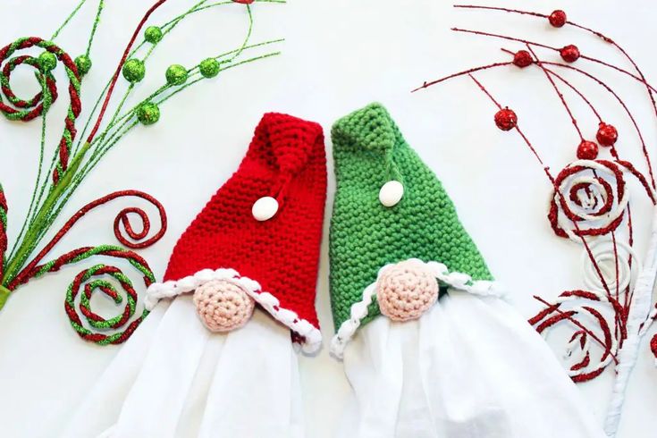 two crocheted christmas stockings laying on top of each other