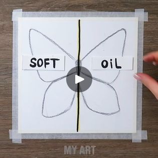 someone is drawing a butterfly on a piece of paper with the words soft oil and my art