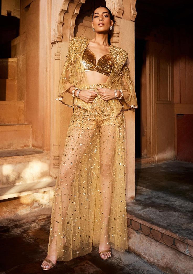 Prevasu-Gold Embellished Pant And Jacket Set-INDIASPOPUP.COM Party Pant Set With Sheer Dupatta, Elegant Festive Pants With Sheer Dupatta, Evening Palazzo Set With Sheer Dupatta, Evening Palazzo Set With Sheer Dupatta For Eid, Glamorous Sequined Lehenga For Celebration, Glamorous Sequined Sets For Eid, Glamorous Sequin Sets For Eid, Eid Party Sharara With Sequins, Eid Party Sequined Sharara