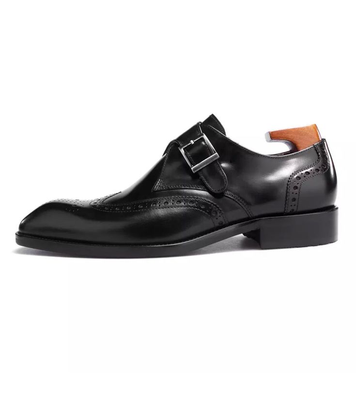 With a mix of Italian craftsmanship and classic design, these handmade shoes are sure to become your new favorites. Each pair is made from gorgeous, feldspathic cowhide leather and expertly handcrafted by our experienced craftsman. We make all of our products using environmentally responsible tanneries and materials. T Black Wingtip Monk Strap Shoes With Brogue Detailing, Black Monk Strap Wingtip Shoes With Brogue Detailing, Black Monk Strap Shoes With Brogue Detailing, Timeless Slip-on Monk Strap Shoes For Galas, Black Wingtip Monk Strap Shoes With Rubber Sole, Black Brogue Detailed Monk Strap Closed Toe Shoes, Black Monk Strap Shoes With Wingtip And Rubber Sole, Designer Monk Strap Shoes With Round Toe For Work, Black Luxury Monk Strap Shoes In Calf Leather