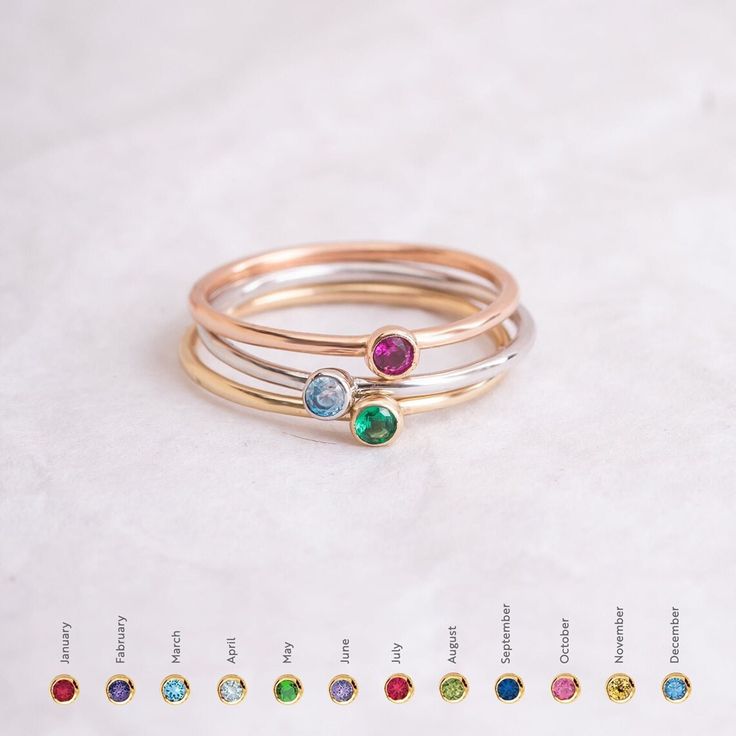 14K 18K Solid Gold Stacking Band Ring with Birthstones, Custom Simple Band Ring is Available Single Double or Triple, Perfect Gift For Women Material: Solid Gold (not gold filled or not gold plated) Available gold karat: 14 K (585) or 18 K (750) Available gold color: Yellow, rose, white The width of this ring is approx 1.1 mm Stone Size: 2.7mm White Gold May Birthstone Ring With Round Stone, Birthday Rings With Bezel Setting, Birthday Birthstone Ring With Bezel Setting, Gold Sapphire Ring With Accent Stones And Round Band, Rose Gold Birthstone Ring With Round Cut, Topaz Birthstone Ring For Gift With Round Band, White Gold Stackable May Birthstone Ring, Topaz Birthstone Ring As Gift With Round Band, Minimalist Yellow Gold Birthstone Ring For Everyday