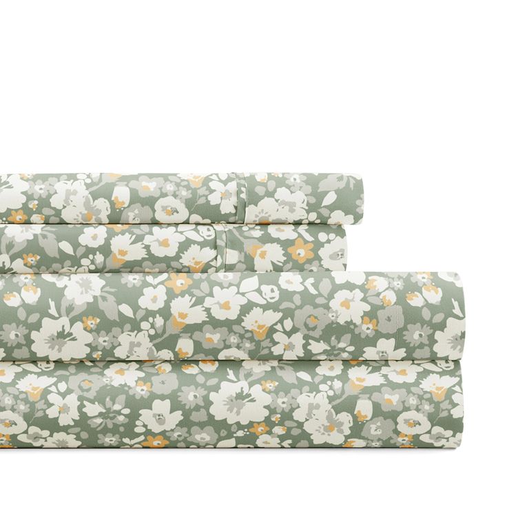 three sheets with floral print on them