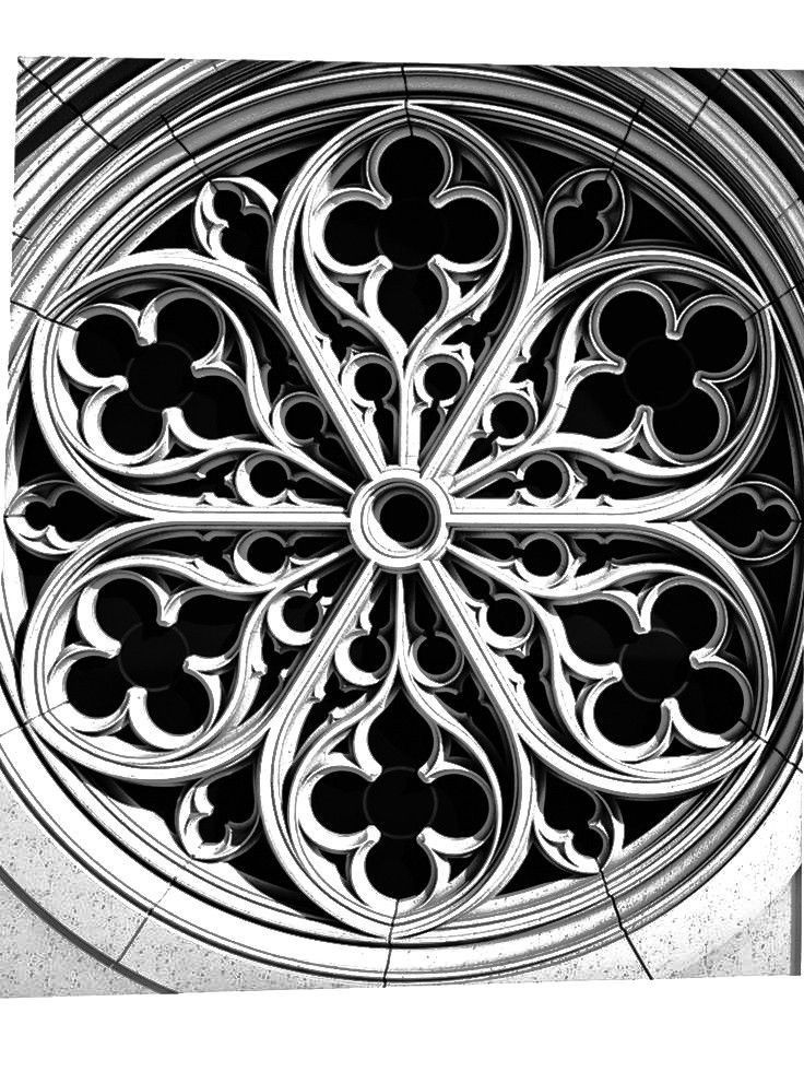 a black and white photo of a circular window