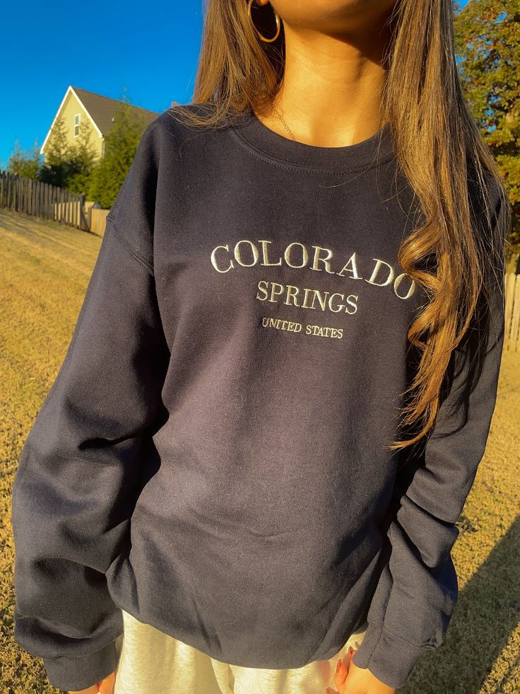 Take a little vacation to Colorado Springs with this crewneck sweatshirt. This sweatshirt features long sleeves, a crew neckline, and beautiful front embroidery. The Unisex Sizing makes the sweatshirt run slightly larger than your average sweatshirt for women. Most men find their normal size to be more snug. If you want a slightly looser fit, size up one size. Please check out our size chart for measurements to ensure an accurate fit. PLEASE BE SURE TO INPUT YOUR CORRECT SIZE/COLOR + SHIPPING AD Crewneck Sweatshirt Women, Everyday Fashion Outfits, Sweatshirt For Women, Embroidered Crewneck, Sweatshirt Women, Colorado Springs, Comfy Outfits, Crew Neckline, Shoes Jewelry