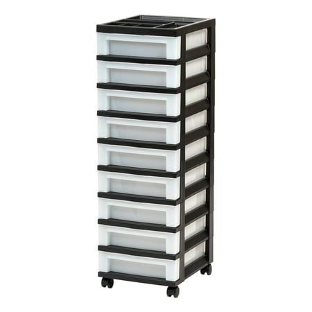 a black and white drawer with five drawers on it's sides, in front of a