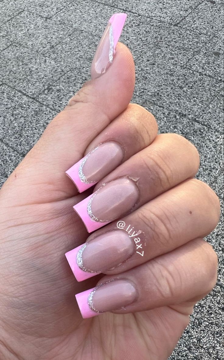 Pink tip acrylics with silver outline Pink French Tips With Silver Outline, Pink French Tip With Silver Line, Hot Pink And Silver Nails, Pink And Silver Nails, Pink Nails With Glitter, Tip Acrylics, Sweet 16 Nails, Blush Pink Nails, Blue And Silver Nails