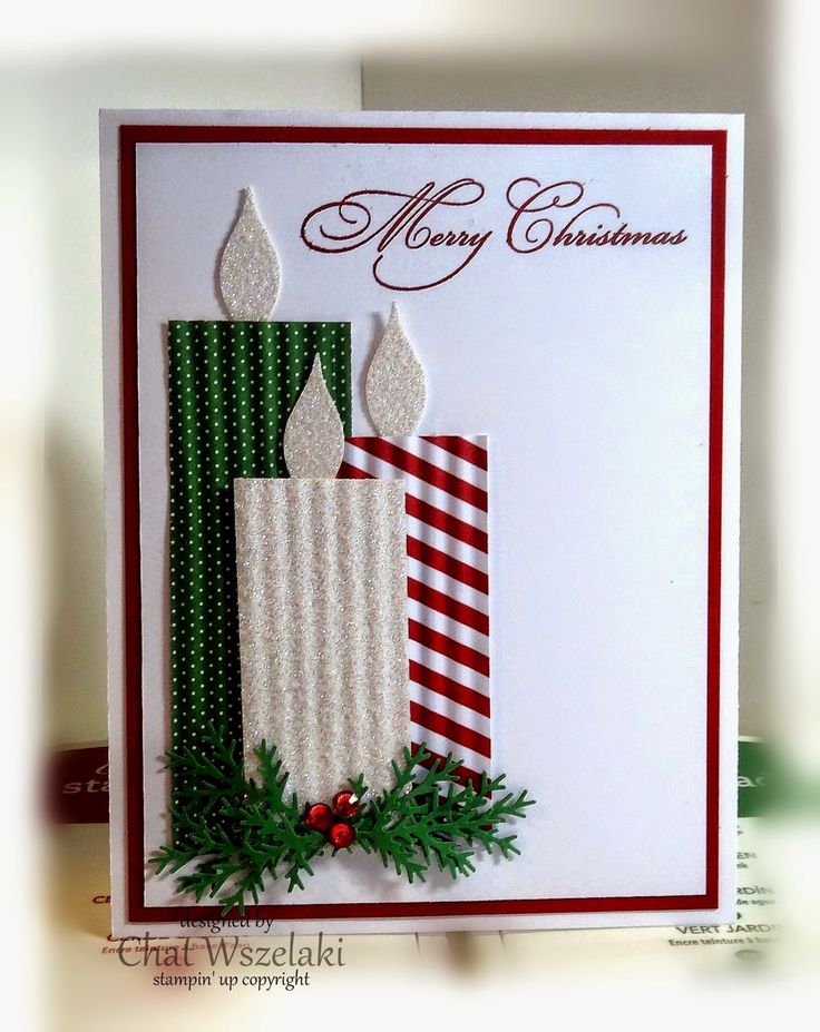 a christmas card with a lit candle on it