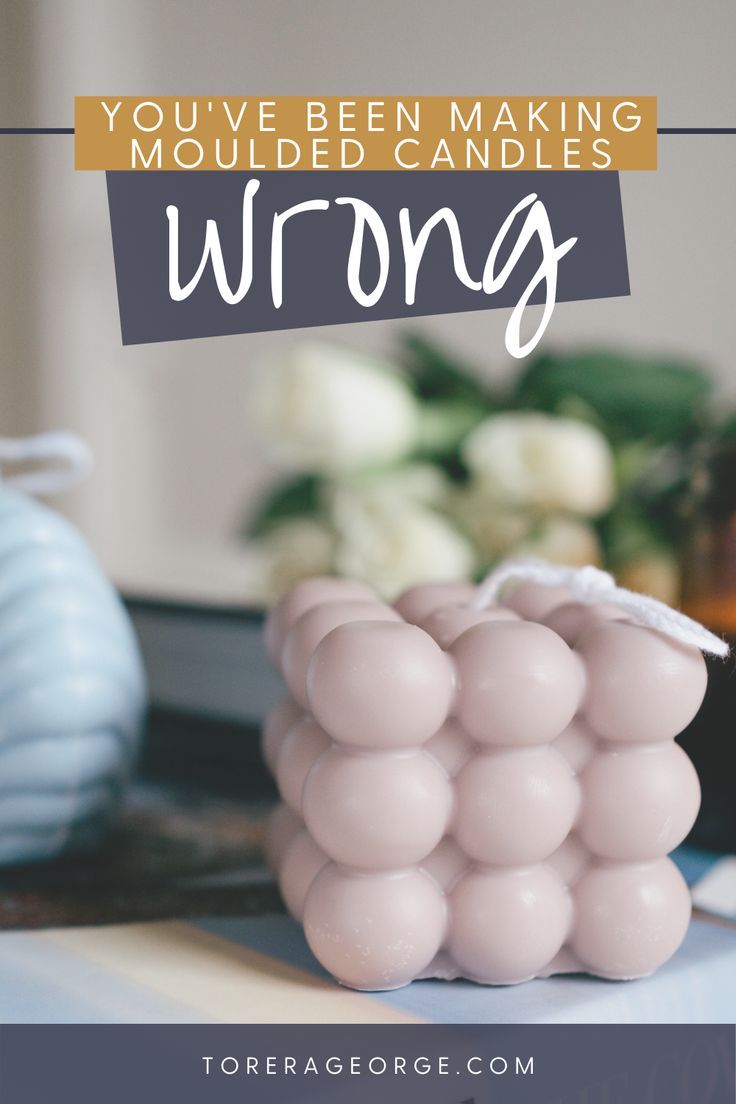 the words you've been making moulded candles wrong on top of a table