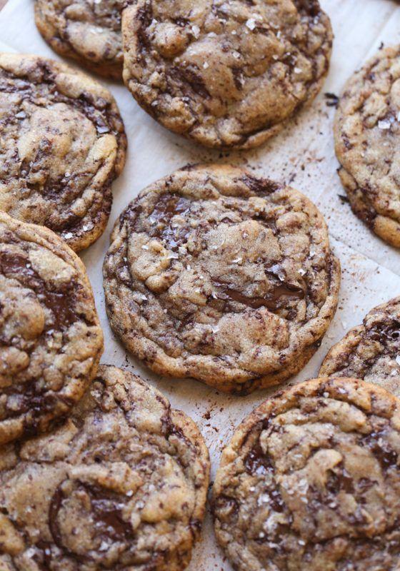 chocolate chip cookies on a baking sheet ready to be eaten