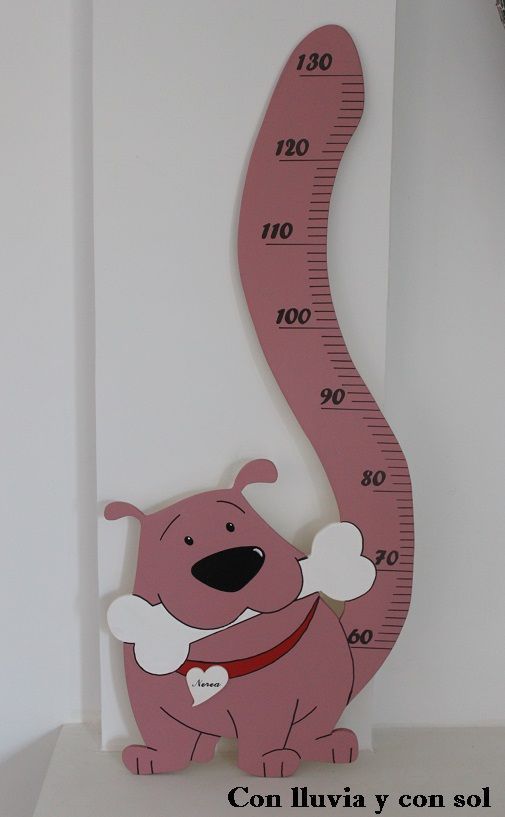 a pink dog with a measuring tape on it's back is standing in front of a white wall