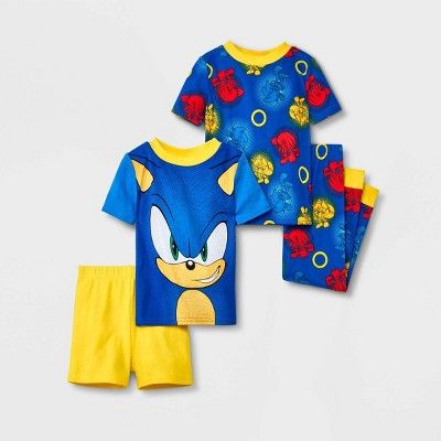 Prep your speedster for fun dreamland adventures in this 4-Piece Sonic the Hedgehog Pajama Set. Crafted from 1x1 rib 100% cotton, this pajama set includes two fitted pairs for a soft feel and all-night cozy comfort. One pair includes a short-sleeve tee featuring an illustration of Sonic on the front with solid sleep shorts. The other pair includes a short-sleeve tee and pajama pants, both featuring allover illustrations of Sonic, Miles and Knuckles. Great as coordinated sets, you can help them m Blue Cotton Character Print Sets, Blue Playful Character Print Sets, Cotton Bedtime Sets With Character Print, Blue Cotton Sets With Character Print, Blue Fun Cartoon Print Sleepwear, Blue Cartoon Print Fun Sleepwear, Fun Cotton Sets With Cartoon Print, Fun Cotton Sets With Character Print, Cotton Sets With Character Print In Fun Style