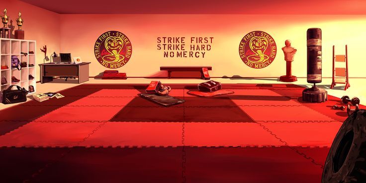 a room with red carpet and various items on the floor in front of it that says strike first strike hard, no mercy