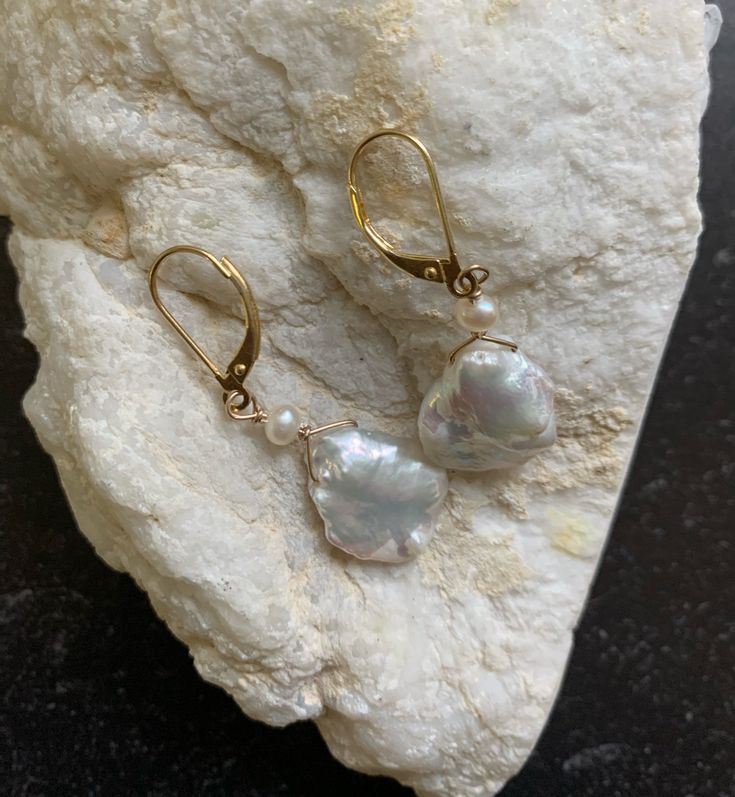 Keshi pearl earring with gold. Each pearl is unique and no two alike. Yellow Gold Pearl Earrings With Pearl Drop, Elegant Pearl Drop Earrings As Gift, Elegant Pearl Drop Earrings For Gift, Handmade Baroque Pearl Earrings For Formal Occasions, Handmade Baroque Pearl Jewelry For Formal Occasions, Brass Pearl Earrings As A Gift, Gold Pearl Pendant Dangle Earrings, Akoya Pearl Drop Earrings For Anniversary, Gold Dangle Pearl Earrings With Pendant