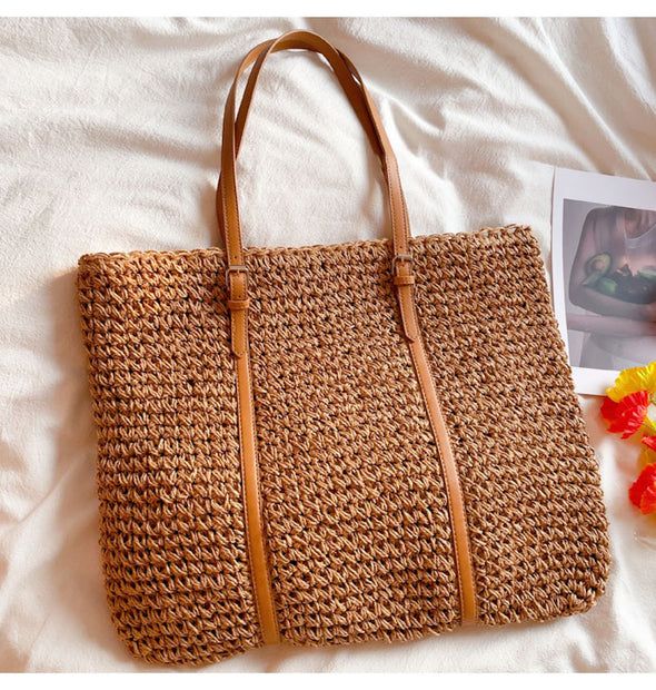 Trendy Brown Straw Beach Bag, Trendy Brown Straw Bag For Beach, Trendy Brown Crochet Bag For Beach Season, Trendy Brown Straw Bag For Travel, Trendy Rattan Straw Bag For Daily Use, Brown Straw Bag For Daily Beach Use, Brown Large Capacity Straw Bag For Beach Season, Trendy Brown Crochet Bag For Vacation, Casual Jute Straw Handheld Bag