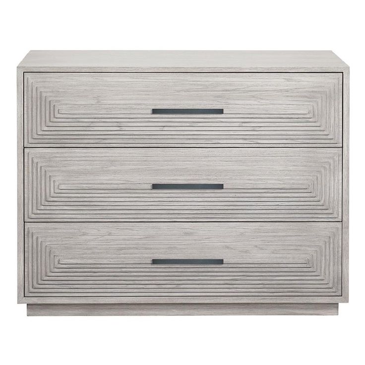 a white dresser with two drawers and black handles