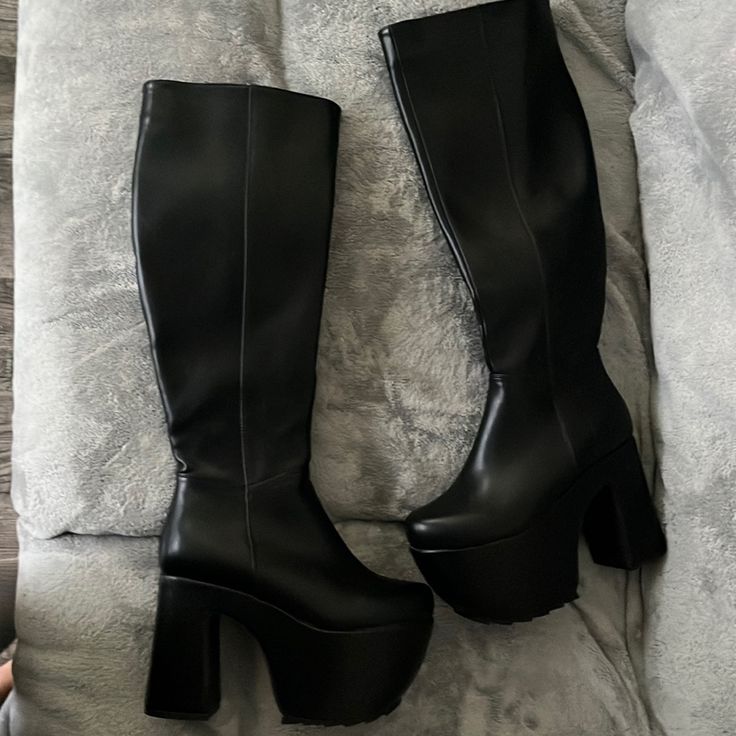 Brand New Never Worn Casual Black Polyurethane Boots, Trendy Black Platform Boots With Stacked Heel, High Platform Boots With Round Toe For Night Out, Black Platform Boots With Round Toe For Spring, Edgy Black Faux Leather Platform Boots, Tall Black Boots For Night Out, Black Heeled Boots With Platform And Square Toe, Black Faux Leather Platform Boots For Fall, Wide Calf Platform Boots For Night Out