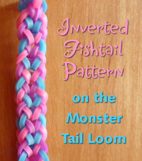 a pink, blue and purple braided loom on a wooden table with the text inverted fishtail pattern on the monster tail loom